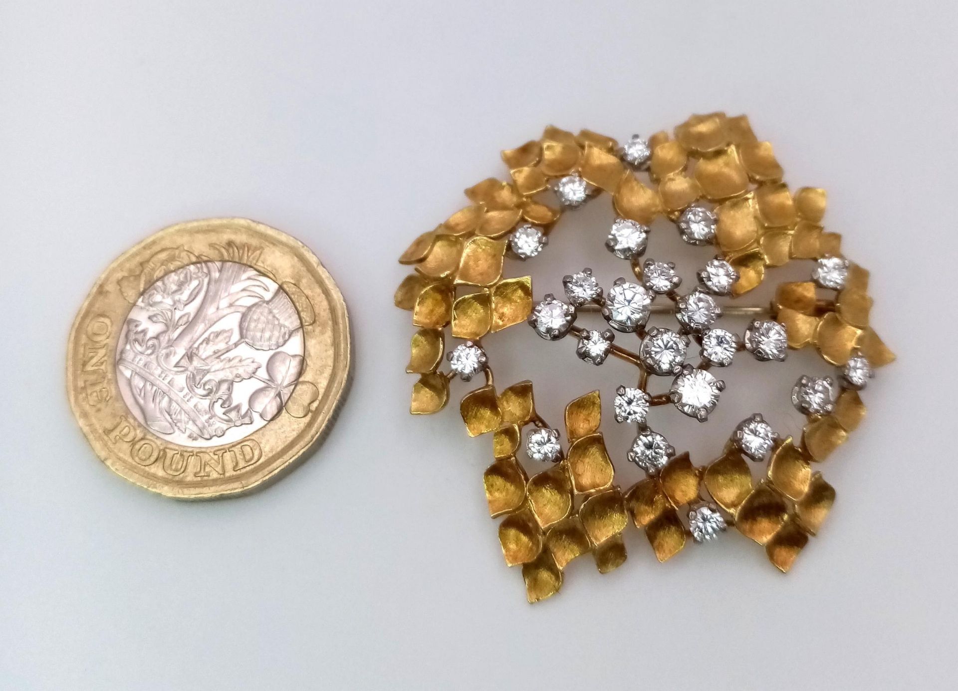 A Magical 18K Yellow Gold and Diamond Brooch. 1.5ctw of brilliant round cut diamonds amongst - Image 6 of 7