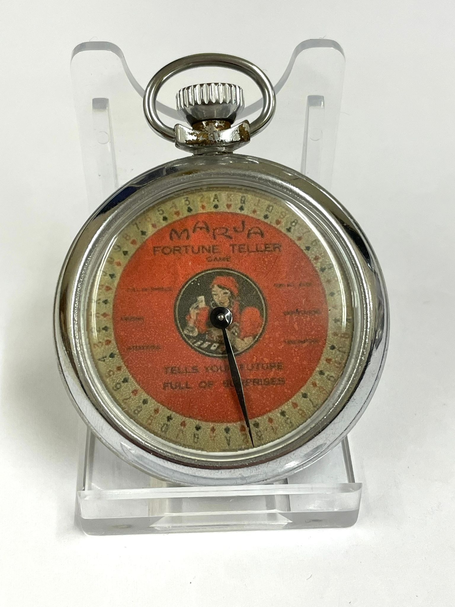 A Vintage fortune teller spinning gaming pocket watch. In working order.