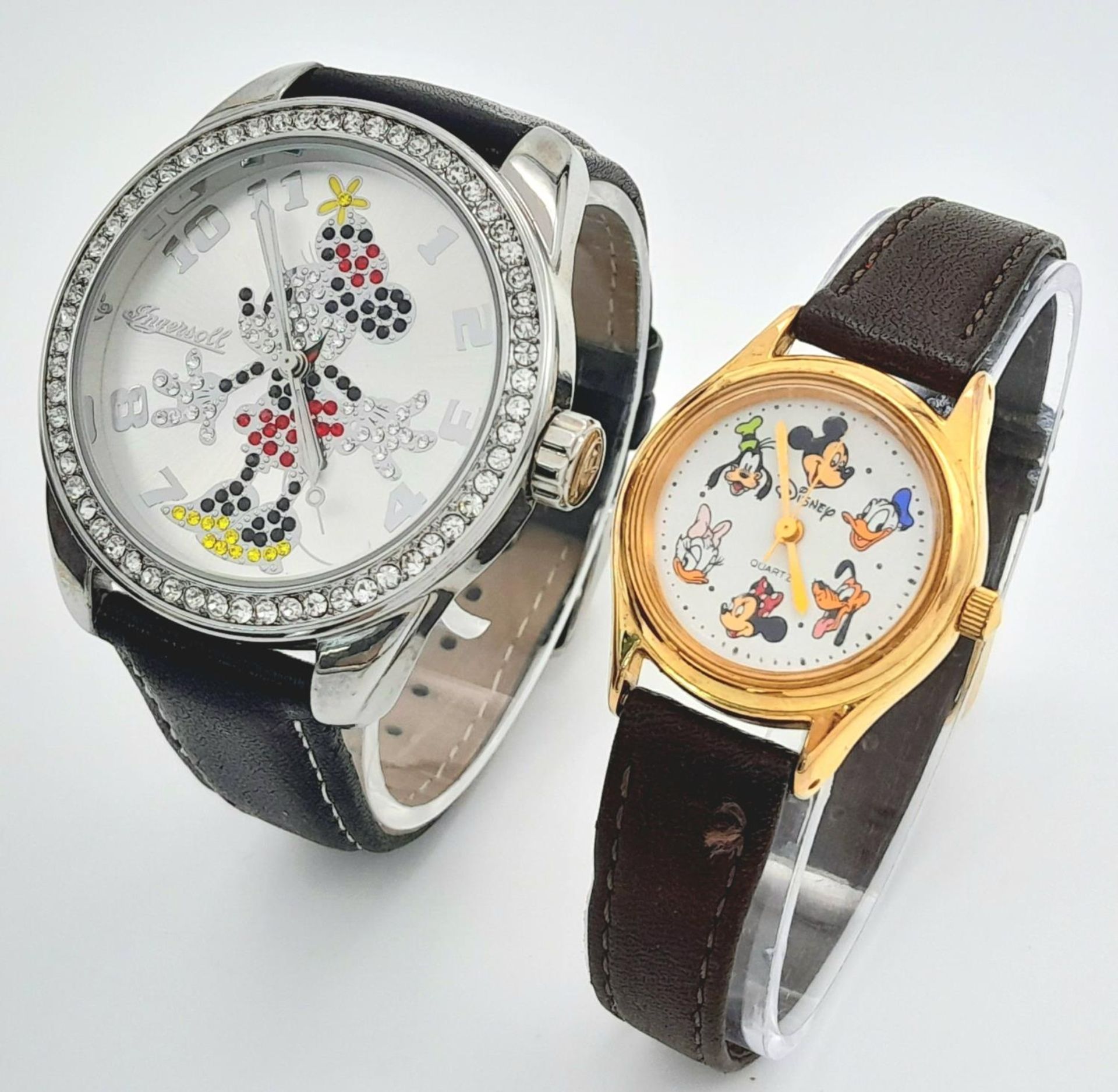 Two Quartz Disney Watches - 39mm and 26mm cases. In working order.