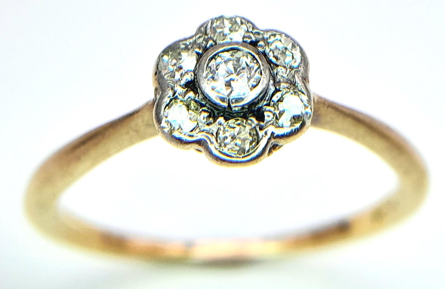 An Antique 18K Yellow Gold Old Cut Diamond Cluster Ring. Size N, 2.05g total weight.