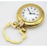 A Gold Plated Cartier Colisee Art Deco Travel Desk Clock. White dial with Roman numerals. 78mm