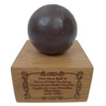 Iron Shot Ball Mounted on a piece of Oak Decking Board that was taken from the British Warship HMS
