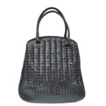A Bottega Veneta Black Bag. Intrecciato leather exterior with two rolled leather handles. Beige