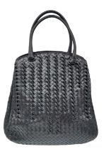 A Bottega Veneta Black Bag. Intrecciato leather exterior with two rolled leather handles. Beige