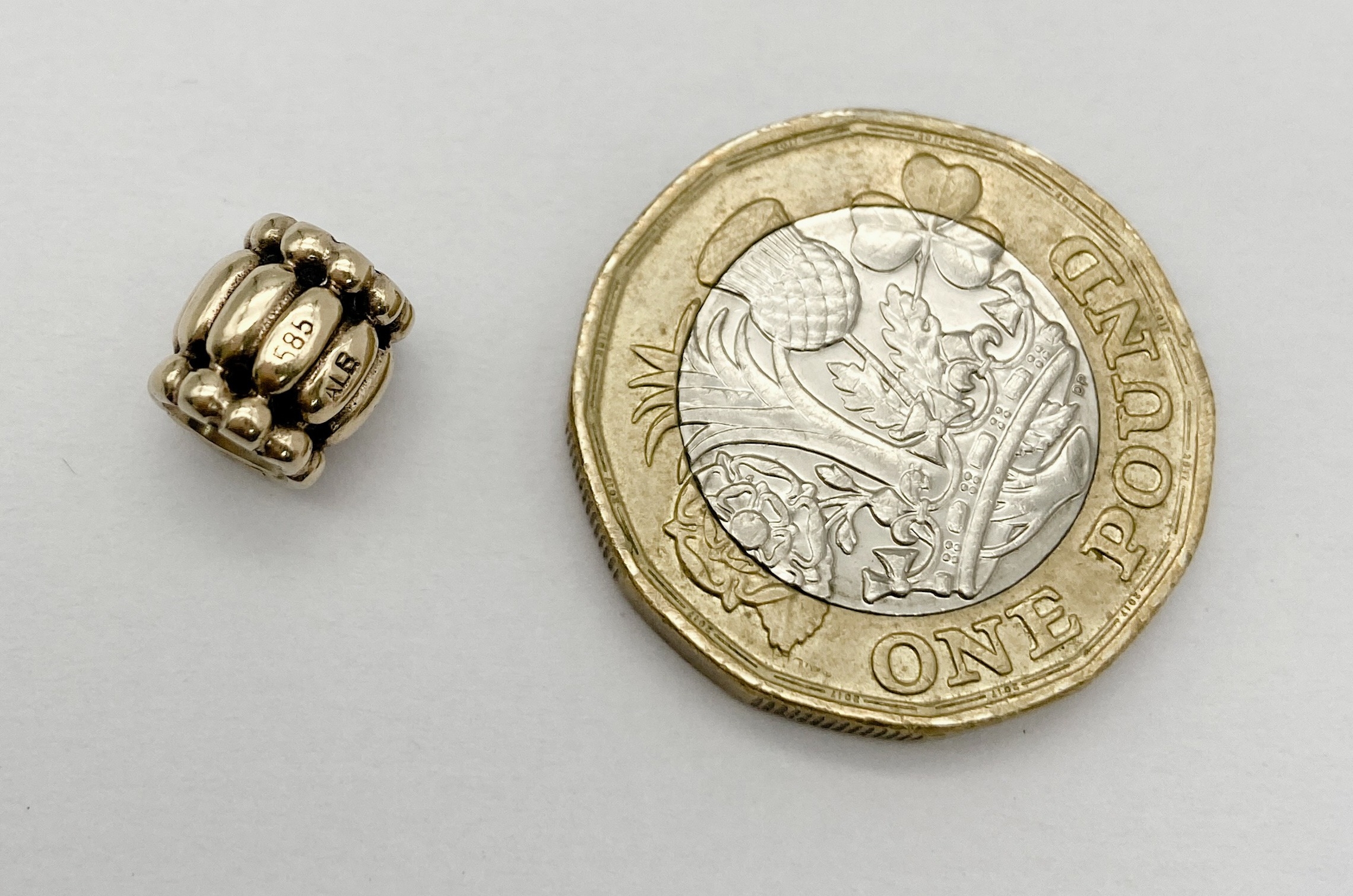 A 14K YELLOW GOLD PANDORA CHARM. 7mm length, 2.2g weight. Ref: SC 8134 - Image 3 of 5