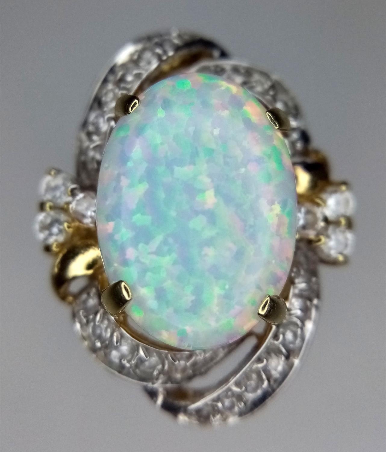A 14K Yellow Gold and Opal Ring. White stone decoration. Size O. 6g total weight. - Image 2 of 7