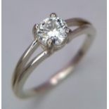 A 0.5ct Moissanite Solitaire Ring. Set in 925 silver. Comes with a GRA certificate. Size M.