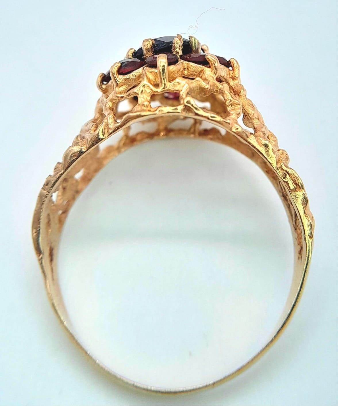 A vintage oval cluster garnet 9ct gold ring surrounded by a halo of bright red garnets in a - Image 5 of 6