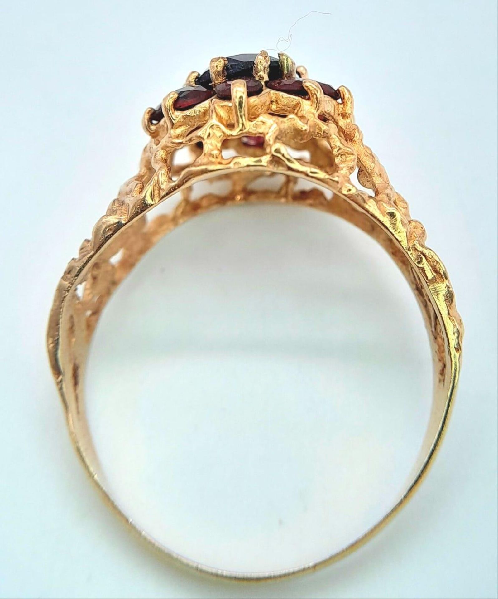 A vintage oval cluster garnet 9ct gold ring surrounded by a halo of bright red garnets in a - Bild 5 aus 6