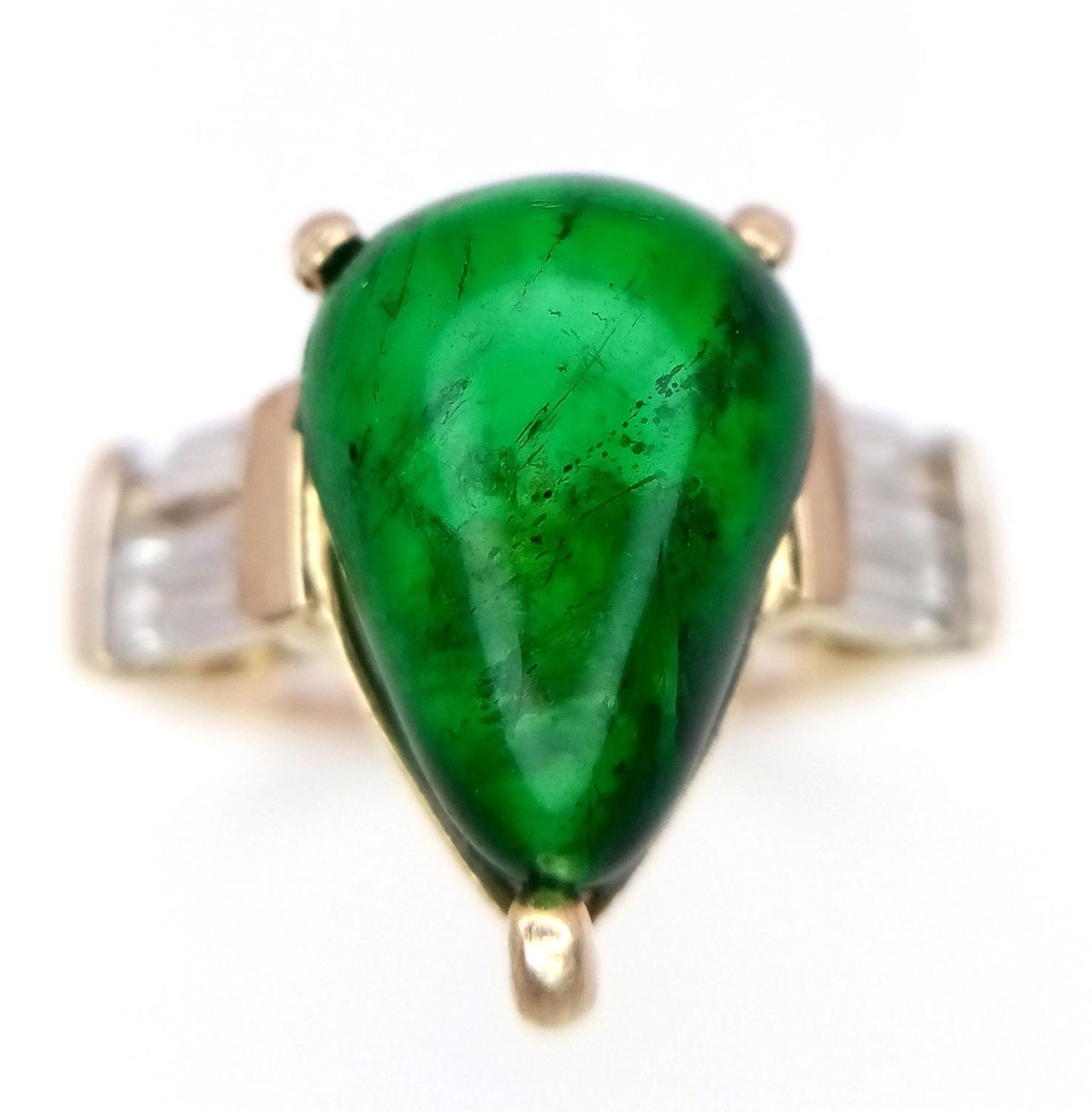 A 9K Yellow Gold Emerald with White Stone Shoulders Ring. Size J/K, 2.9g total weight.