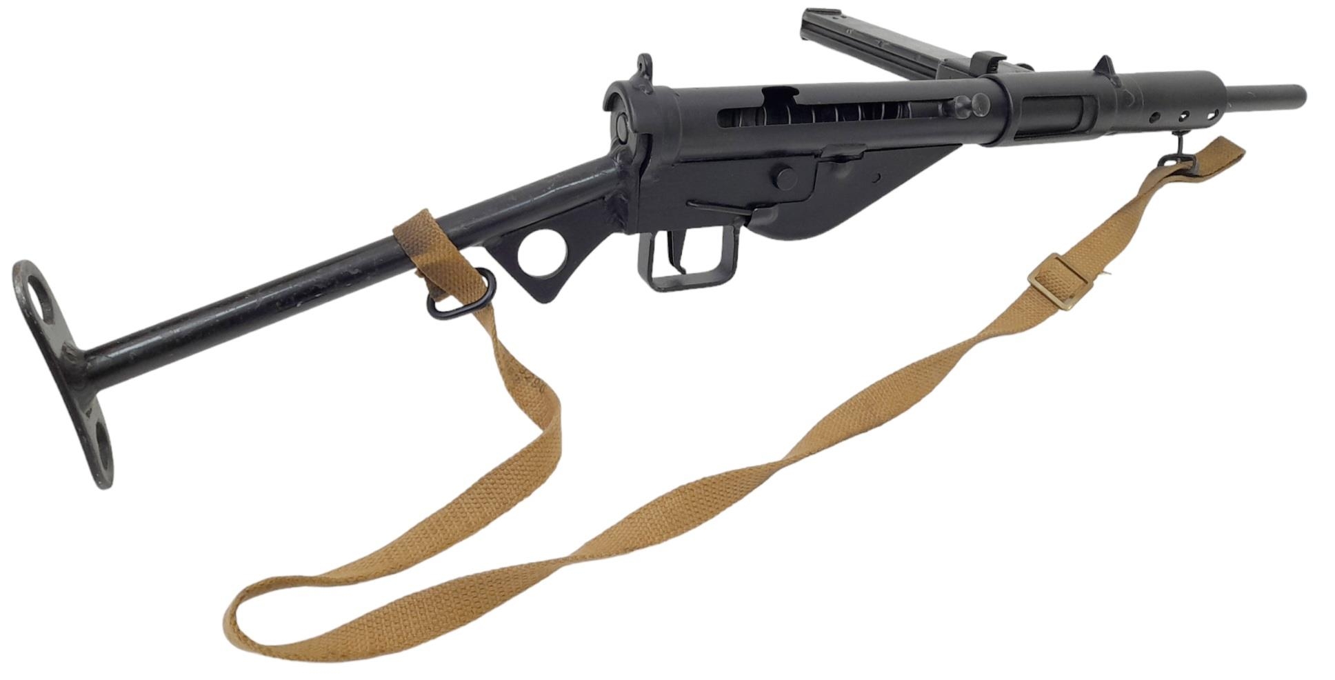 A Deactivated Maltby Sten Sub Machine Gun MKII. This British WW2 weapon was cheap and quick to - Image 2 of 5