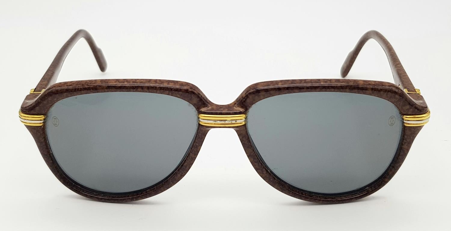 A Pair of Cartier Brown Vitesse Sunglasses. Elegant marble carbon frame with Cartier watermarks on - Image 3 of 9