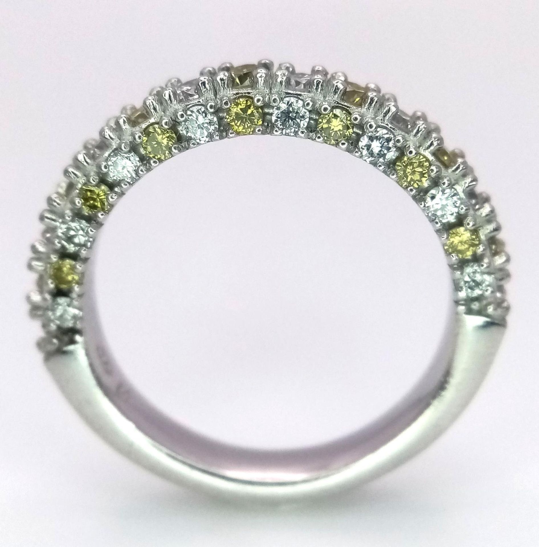 A Platinum White and Yellow Diamond Three-Sided Half Eternity Ring. Size L. 6.3g total weight. - Image 3 of 9