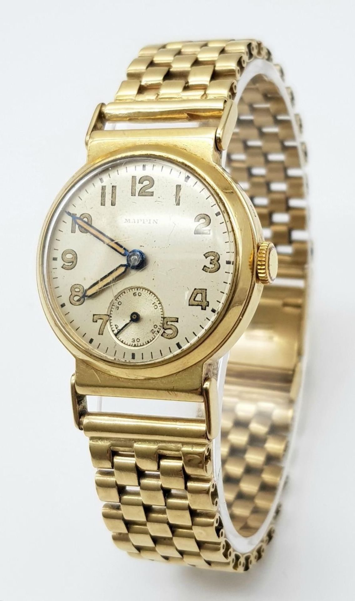 A Vintage (1950s) Mappin and Webb 9K Gold Watch. 9K gold bracelet and case - 28mm. Patinated dial