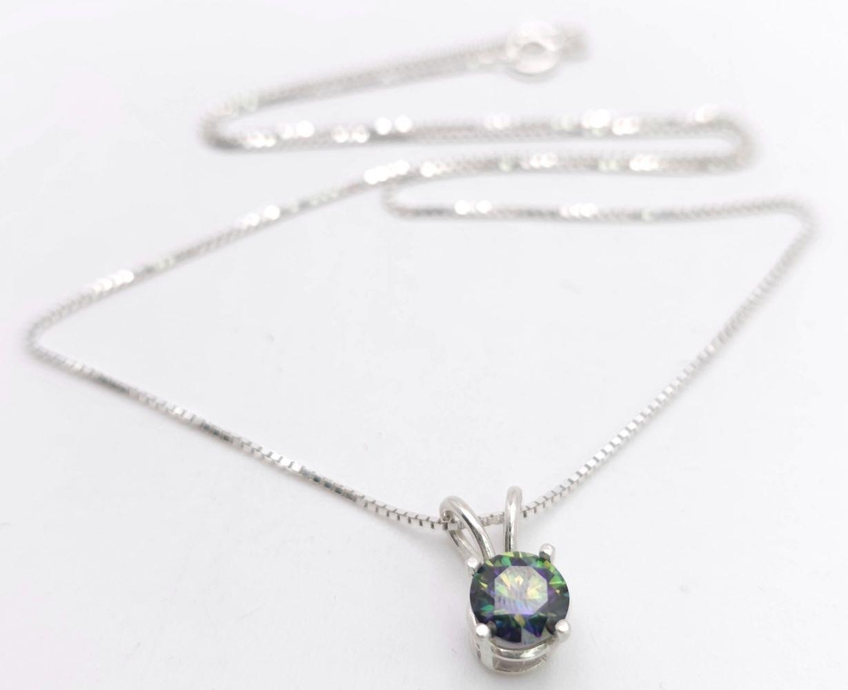 A Rainbow Moissanite Pendant on a 925 Silver Necklace. 1cm and 42cm. Comes with a GRA certificate.