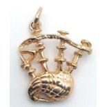 A 9K YELLOW GOLD BAGPIPES CHARM. 2cm length, 1.7g weight. Ref: SC 9059