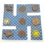 3rd Reich Archaeology Set of Winterhilf Tinnie Badges. The set of 9 badges are a portrayal of pre-