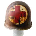 WW2 US M1 Swivel Bale Medics Helmet with Capac Liner. The helmet has the correct front edgeseam