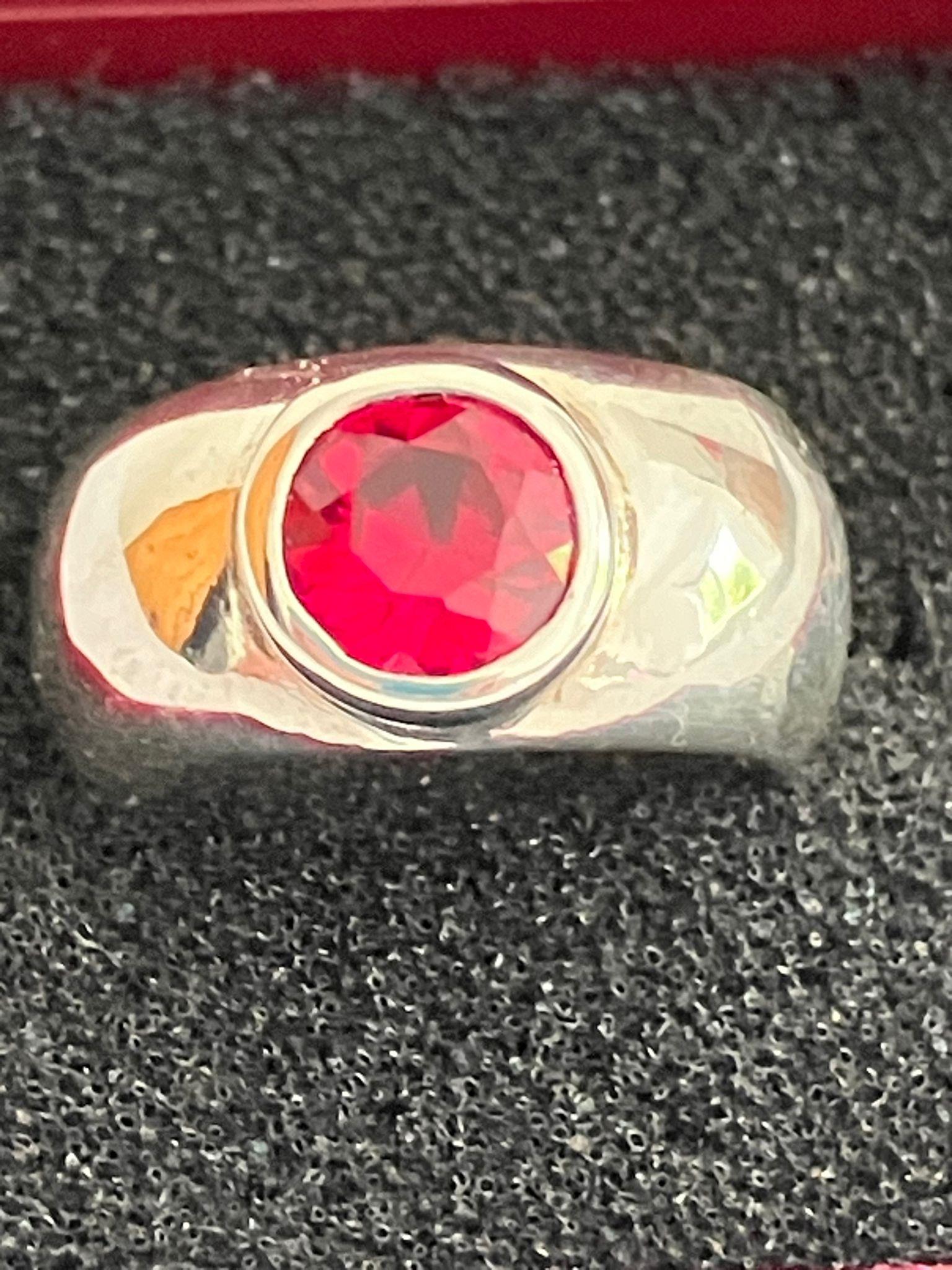 SILVER and RUBY RING, consisting a 1.5 carat Round Cut Ruby mounted to top of a Wide Silver Band. - Image 3 of 3