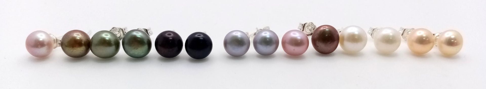 Seven Pairs of Freshwater Pearl Stud Earrings - Pastel Coloured and set in 925 silver.