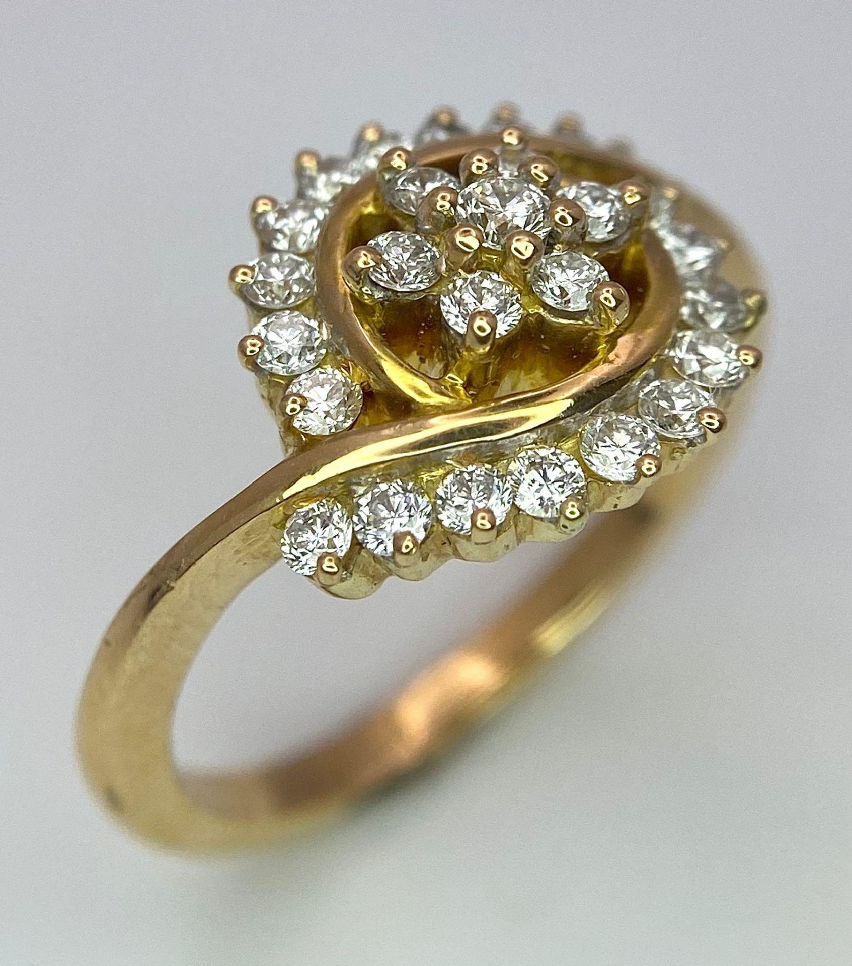 An attractive 14K Yellow Gold (tested as) Diamond Swirl Ring, 0.55ct diamond weight, 4.6g total - Image 2 of 6