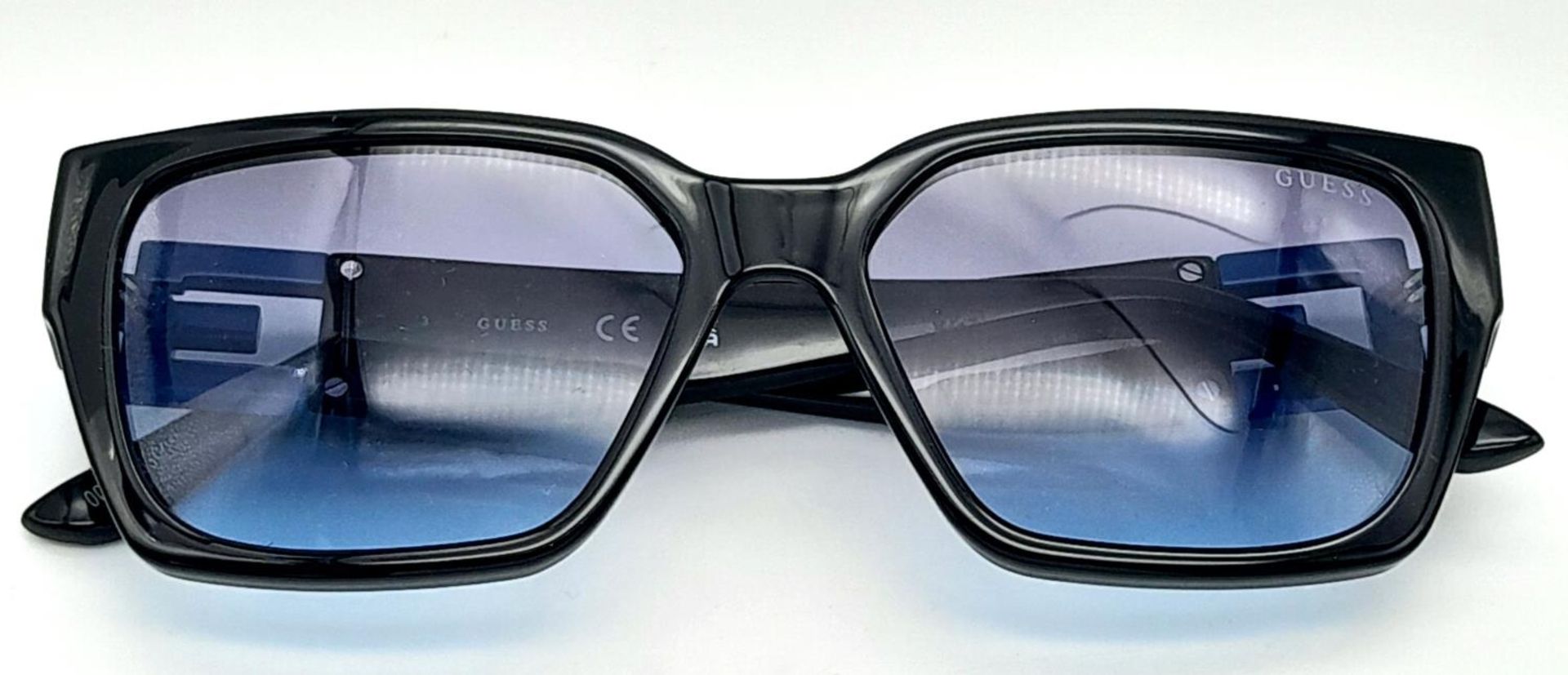 A Pair of Designer Guess Sunglasses. - Image 2 of 5