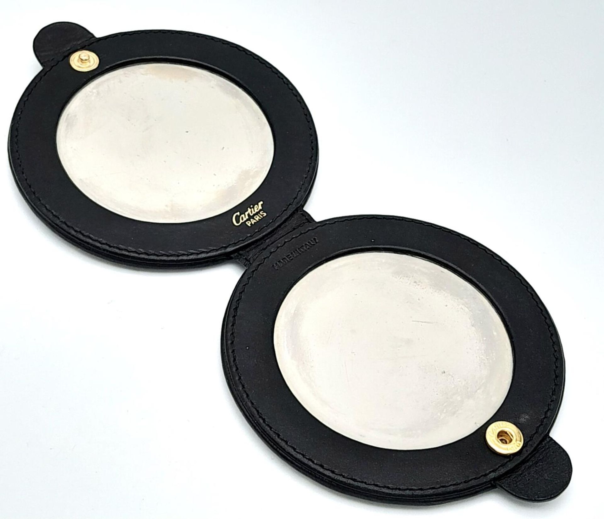 A vintage, CARTIER PANTHER double vanity mirror in a soft black leather cover, diameter: 9 cm. - Bild 2 aus 6