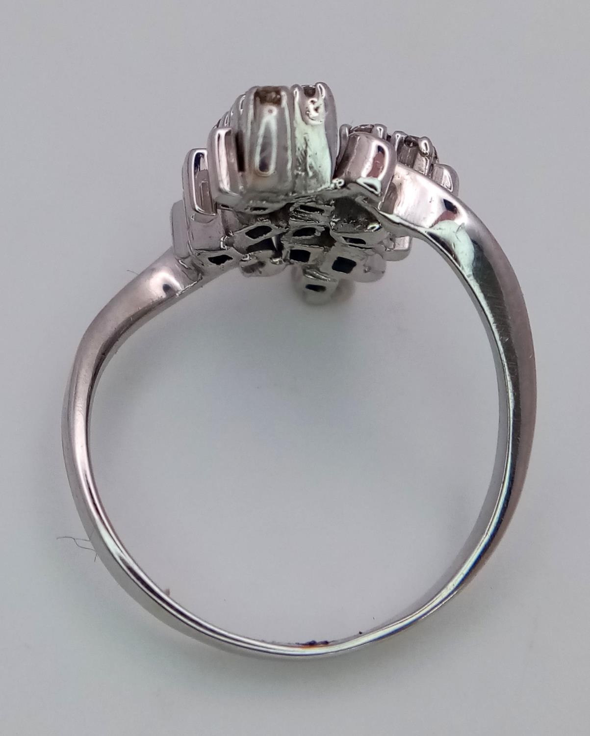 AN 18K WHITE GOLD DIAMOND FANCY CLUSTER RING. 0.25ctw, size O, 4.6g total weight. Ref: SC 9036 - Image 4 of 5