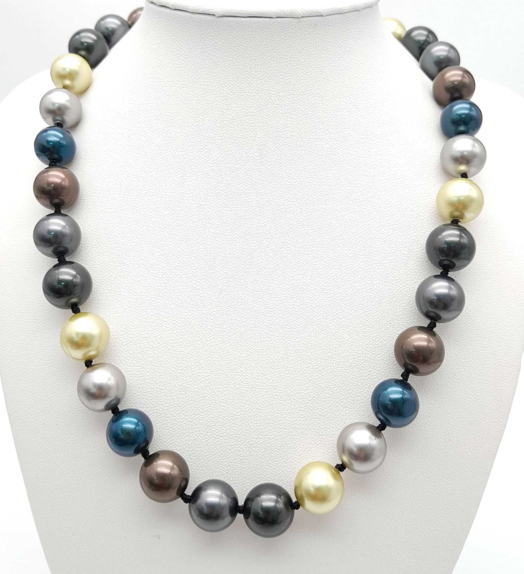 A Multi-Colour South Sea Pearl Shell Beaded Necklace. 12mm. Necklace length - 45cm length.