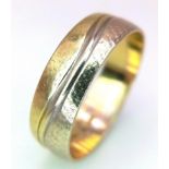 A 14K Yellow Gold Band Ring with Swirl Decoration. Size O. 2.9g weight.