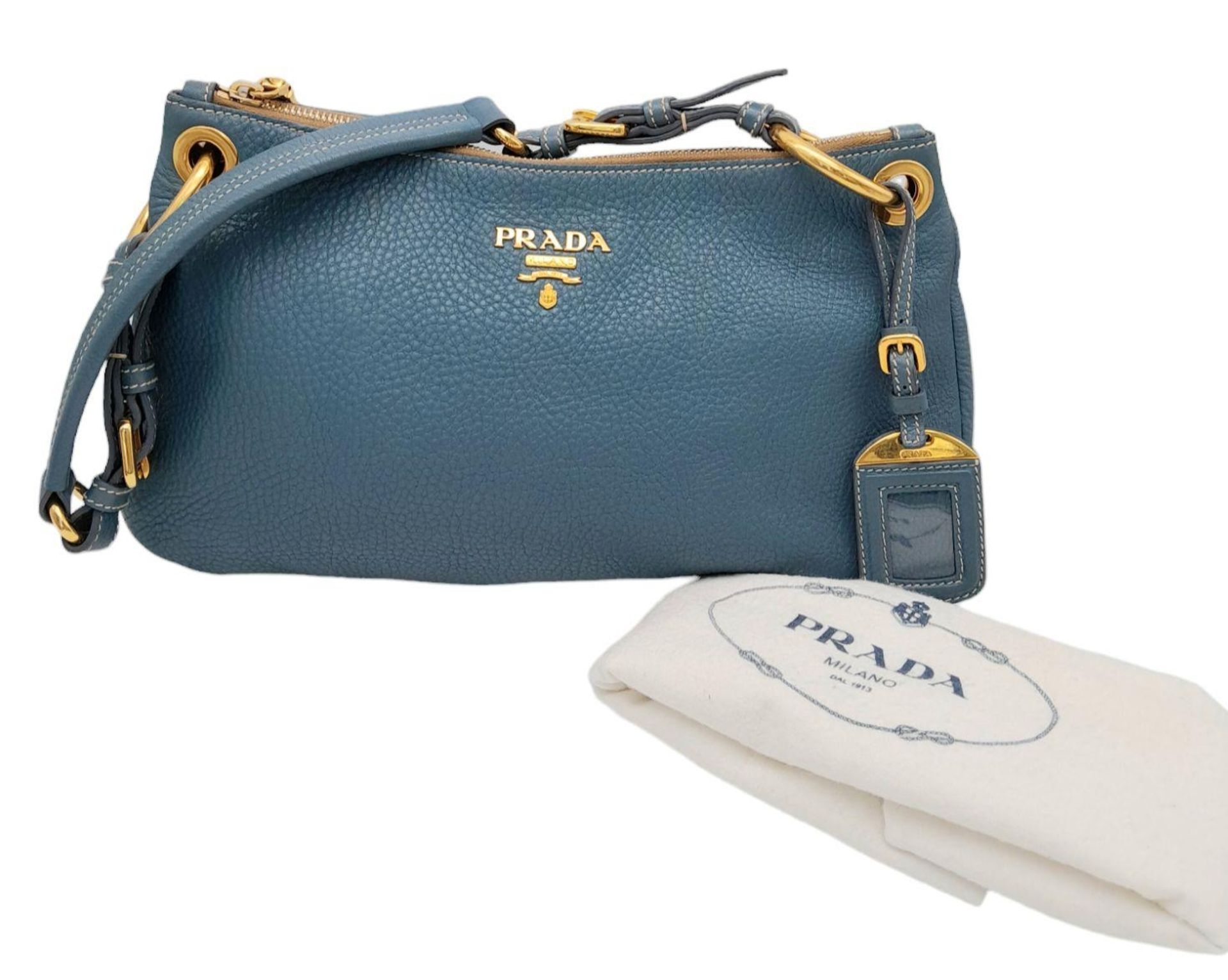 A Prada Marine Blue Vitello Daino Shoulder Bag. Leather exterior with gold-toned hardware, - Bild 3 aus 8