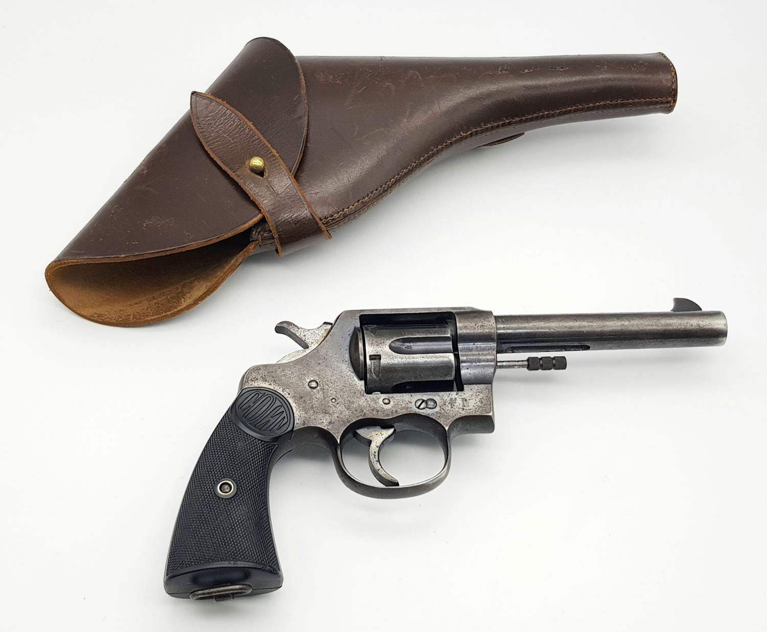 A Rare WW1 Deactivated Colt Revolver with Leather Holster. These British contract Colt revolvers