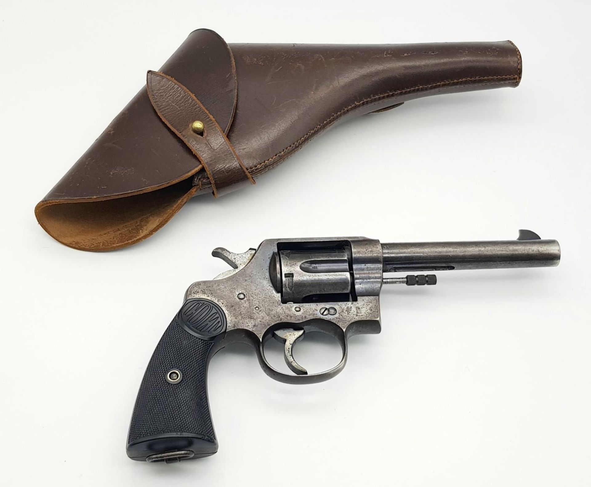 A Rare WW1 Deactivated Colt Revolver with Leather Holster. These British contract Colt revolvers
