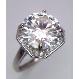 A 5ct Moissanite 925 Silver Ring. Size P. Comes with a GRA certificate.