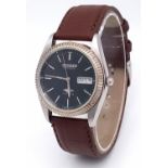 A Citizen 21 Jewel Automatic Gents Watch. Brown leather strap. Stainless steel case - 36mm. Black