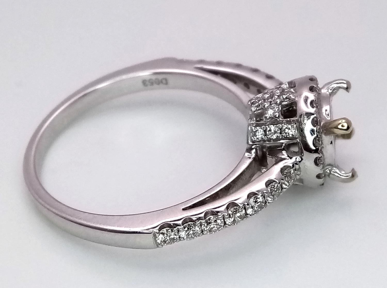 AN 18K WHITE GOLD DIAMOND HALO SOLITAIRE RING MOUNT WITH DIAMOND SET SHOULDERS. Ready to set your - Image 6 of 8