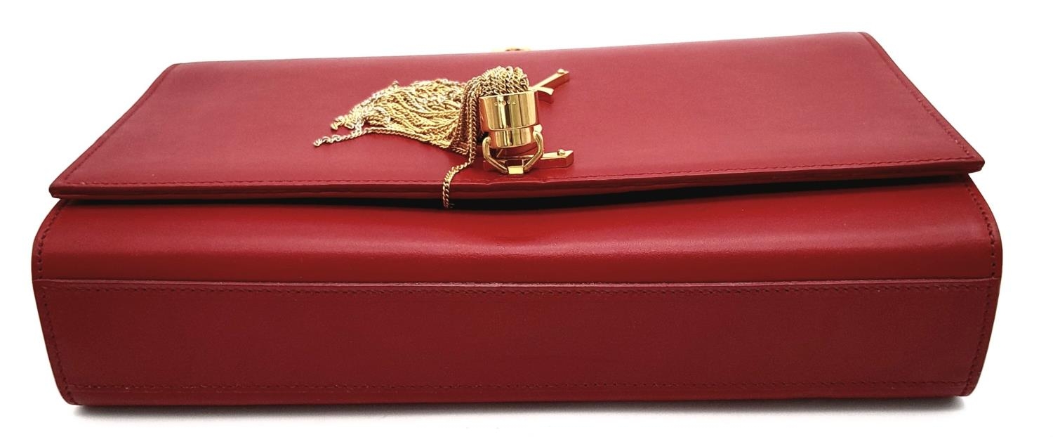 A YSL Red Kate Tassel Crossbody Bag. Leather exterior with gold-toned hardware, the iconic YSL logo, - Image 5 of 12