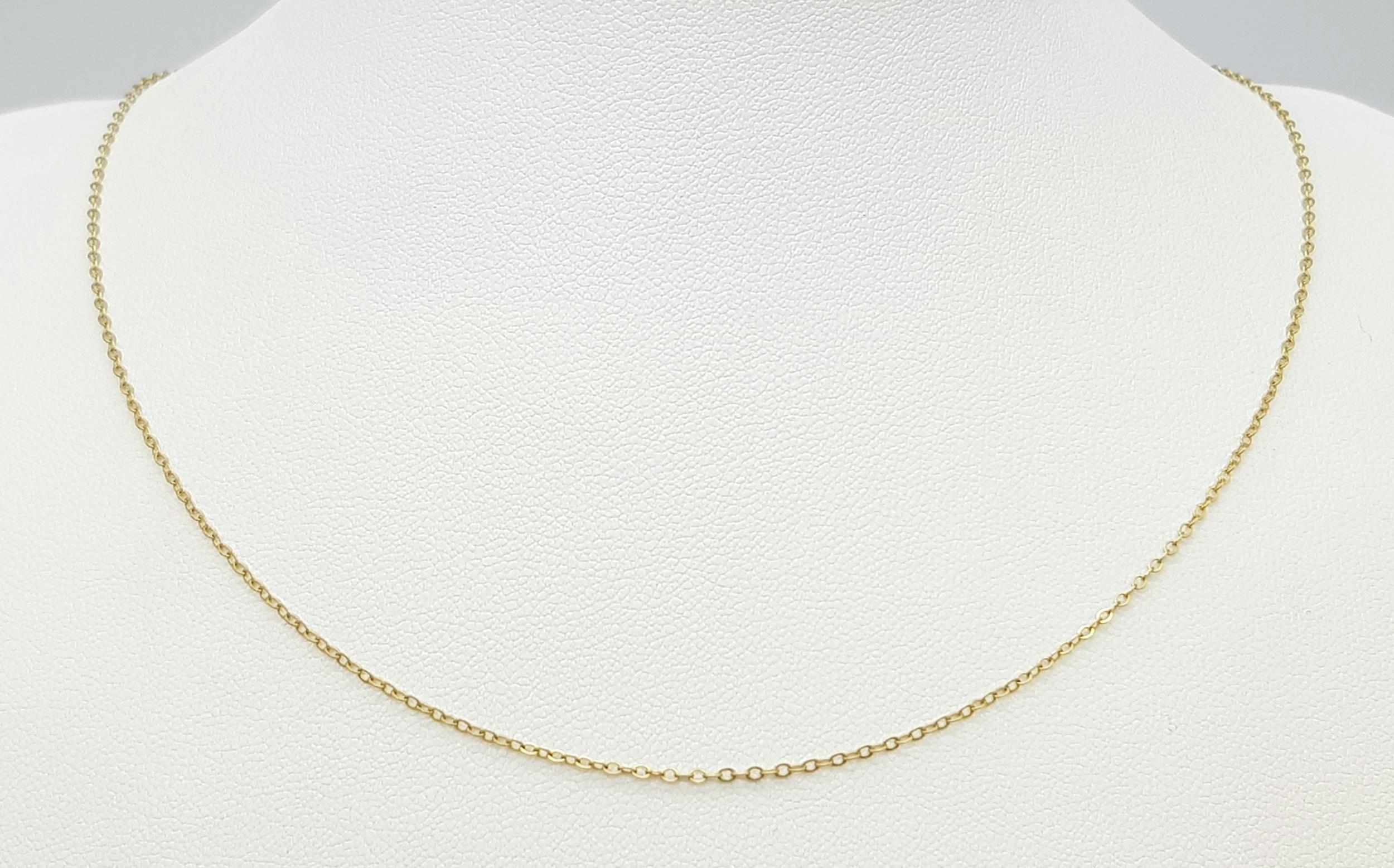 A 9K Yellow Gold Disappearing Necklace. 42cm. 0.9g