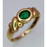 A Vintage 9K Yellow Gold and Emerald Ring. Size J. 2g total weight.