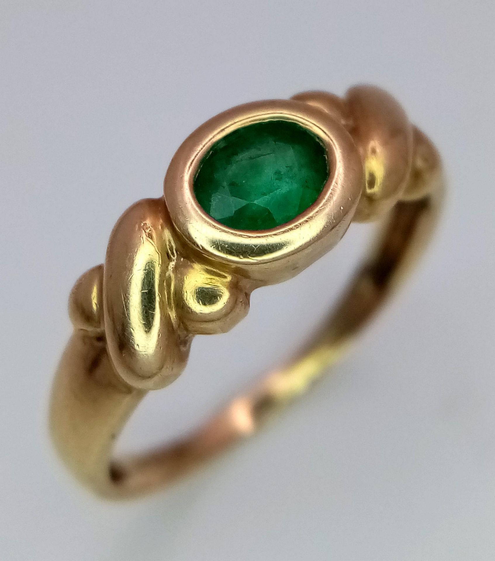 A Vintage 9K Yellow Gold and Emerald Ring. Size J. 2g total weight.