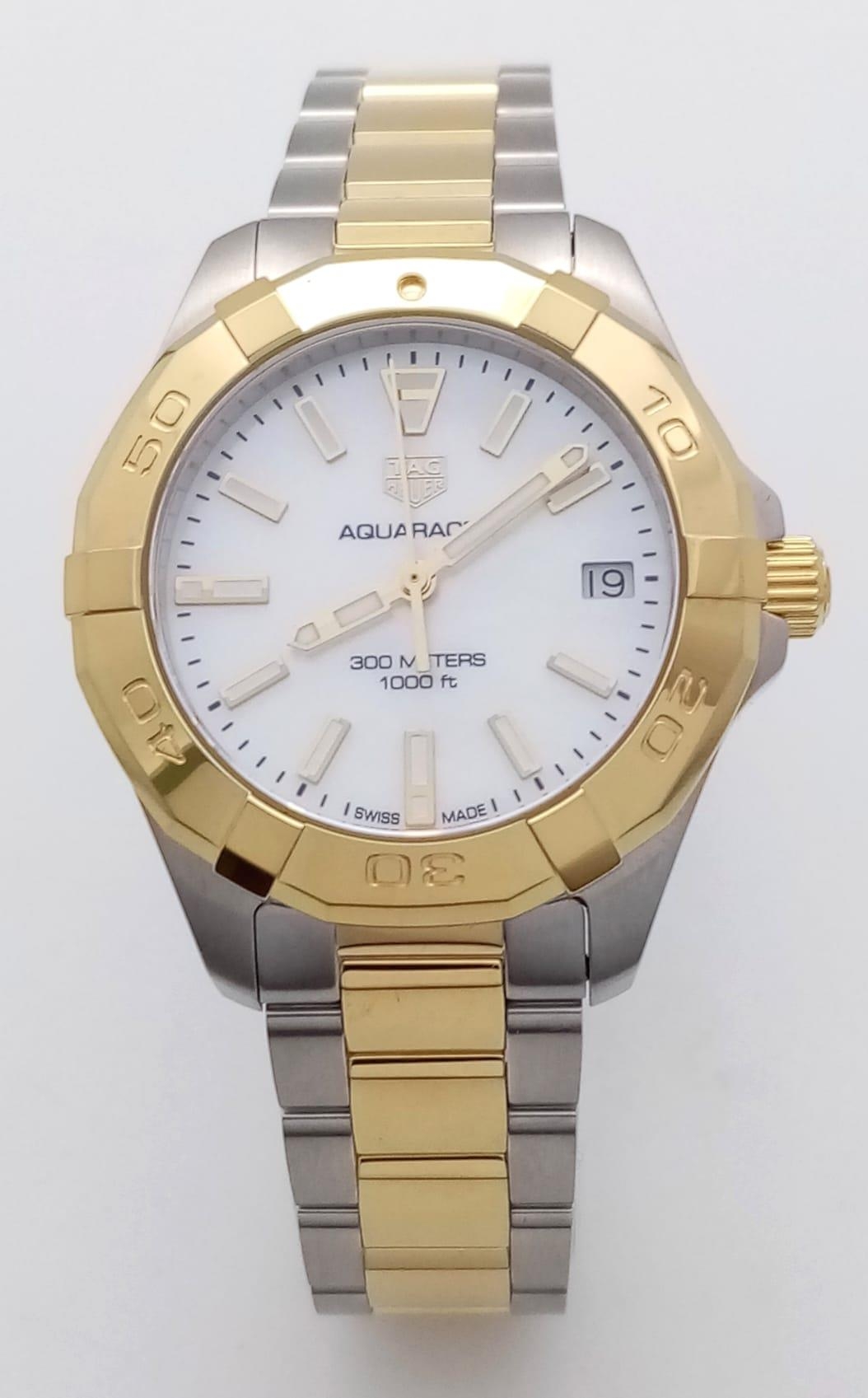 A Tag Heuer Aquaracer Ladies Quartz Watch. Two tone gold plated steel bracelet and case - 32mm. - Image 2 of 13