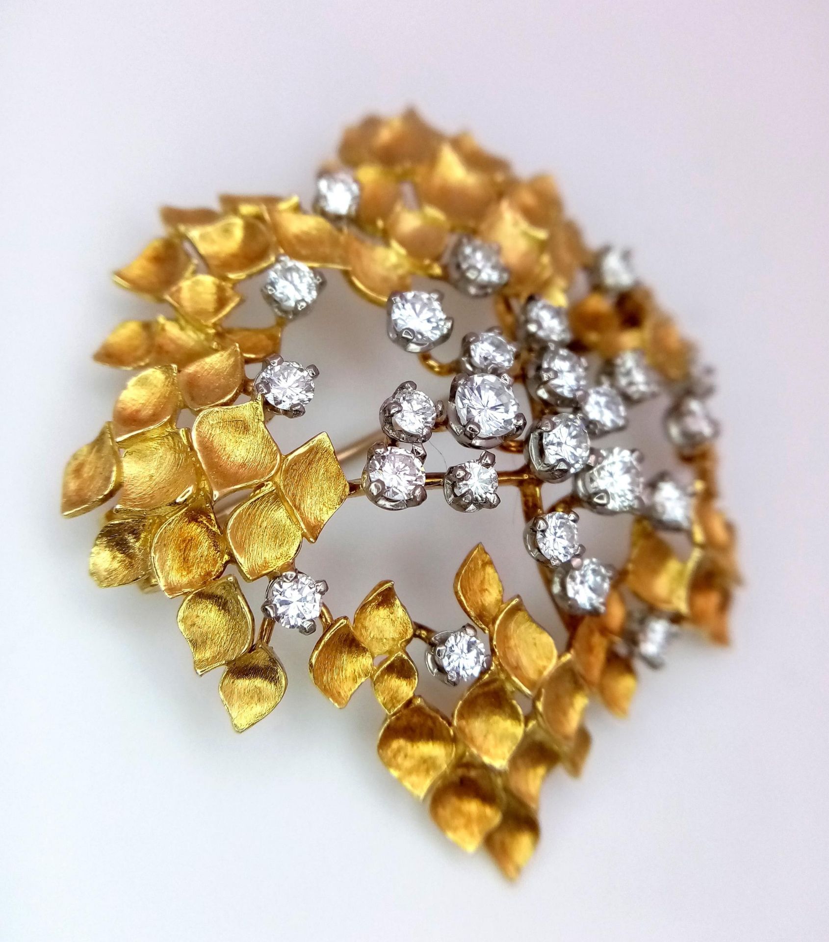 A Magical 18K Yellow Gold and Diamond Brooch. 1.5ctw of brilliant round cut diamonds amongst - Image 2 of 7