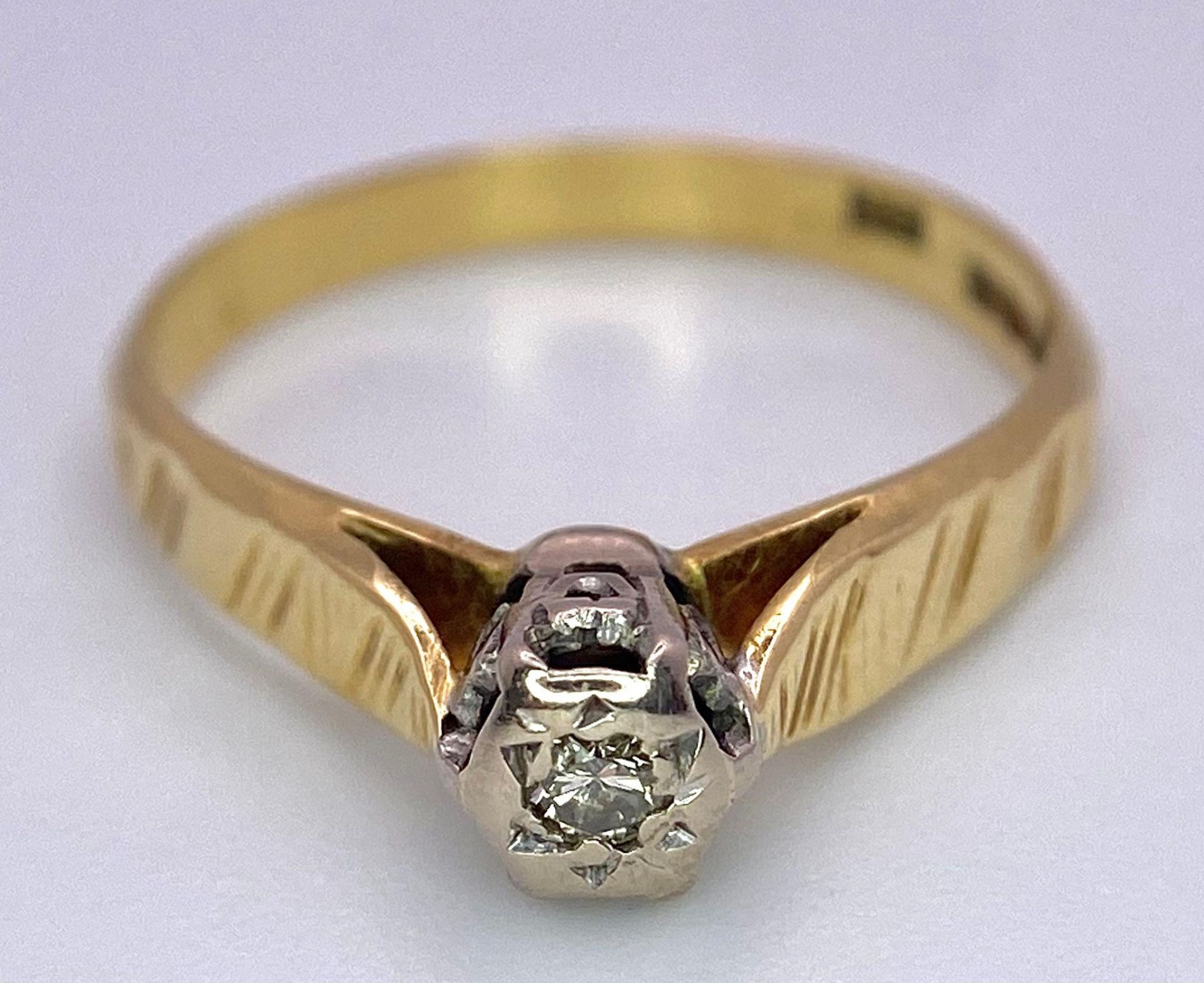 A Vintage 18K Yellow Gold Diamond Solitaire Ring. Size L. 2.41g total weight. Full UK hallmarks. - Image 4 of 5