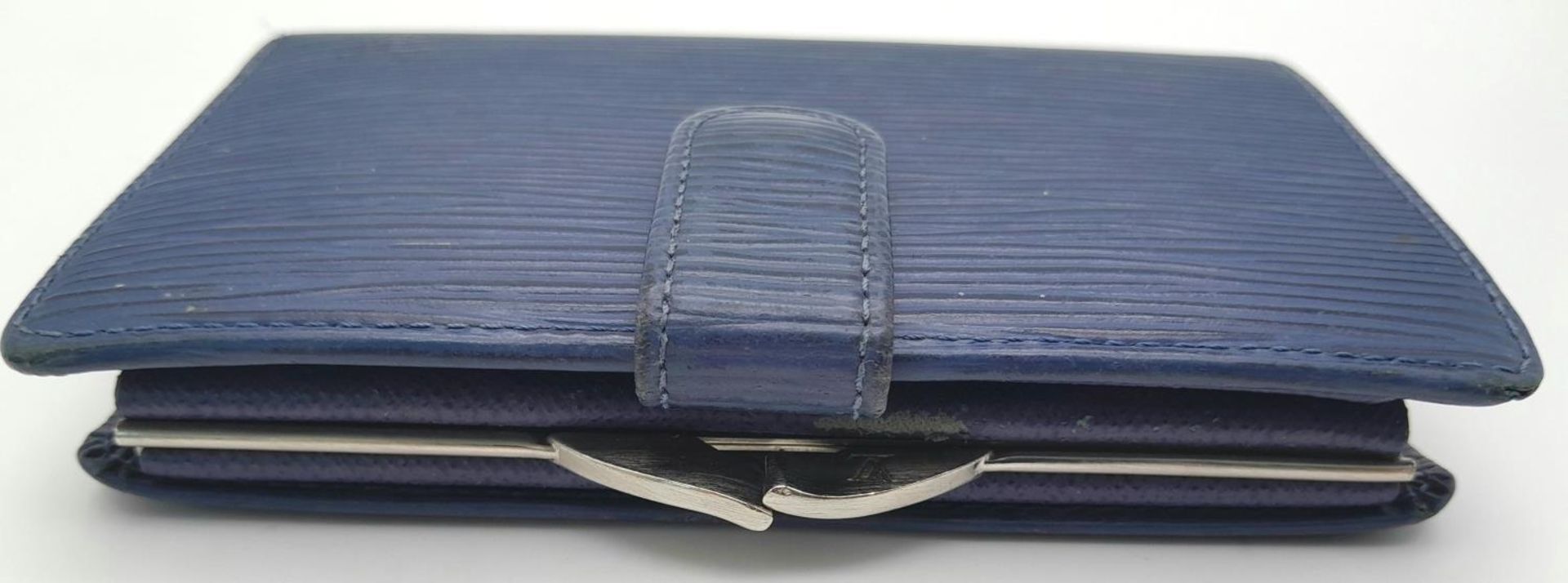 A Vintage Louis Vuitton Blue Bifold Wallet. Epi leather exterior with silver-toned hardware and - Image 3 of 17