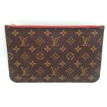 A Louis Vuitton Neverfull Pochette. Monogramed canvas exterior with gold-toned hardware and zip