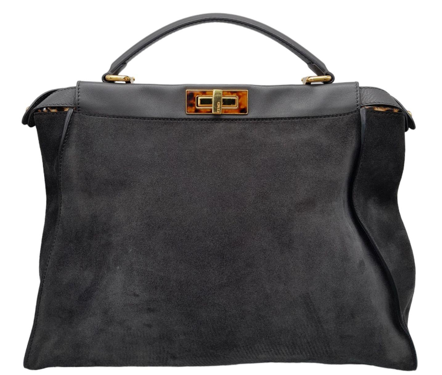 A Fendi Grey Peekaboo Bag. Suede exterior with leather trim, single leather handle, gold-toned - Image 2 of 9