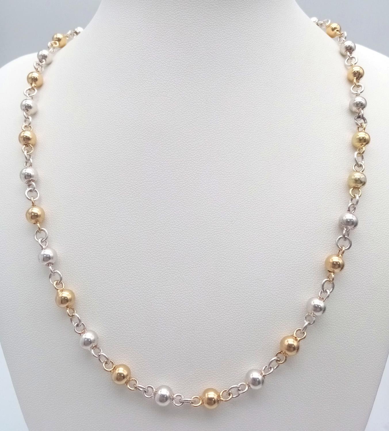 A 925 Silver and Gilded Bauble Necklace - 44cm. 19.5g
