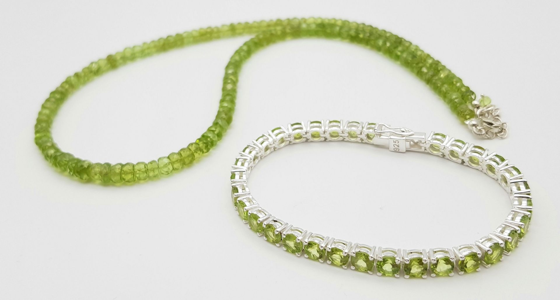 A Peridot Gemstone Tennis Bracelet with a Peridot Rondelle Necklace. Both with silver clasps. - Image 2 of 6