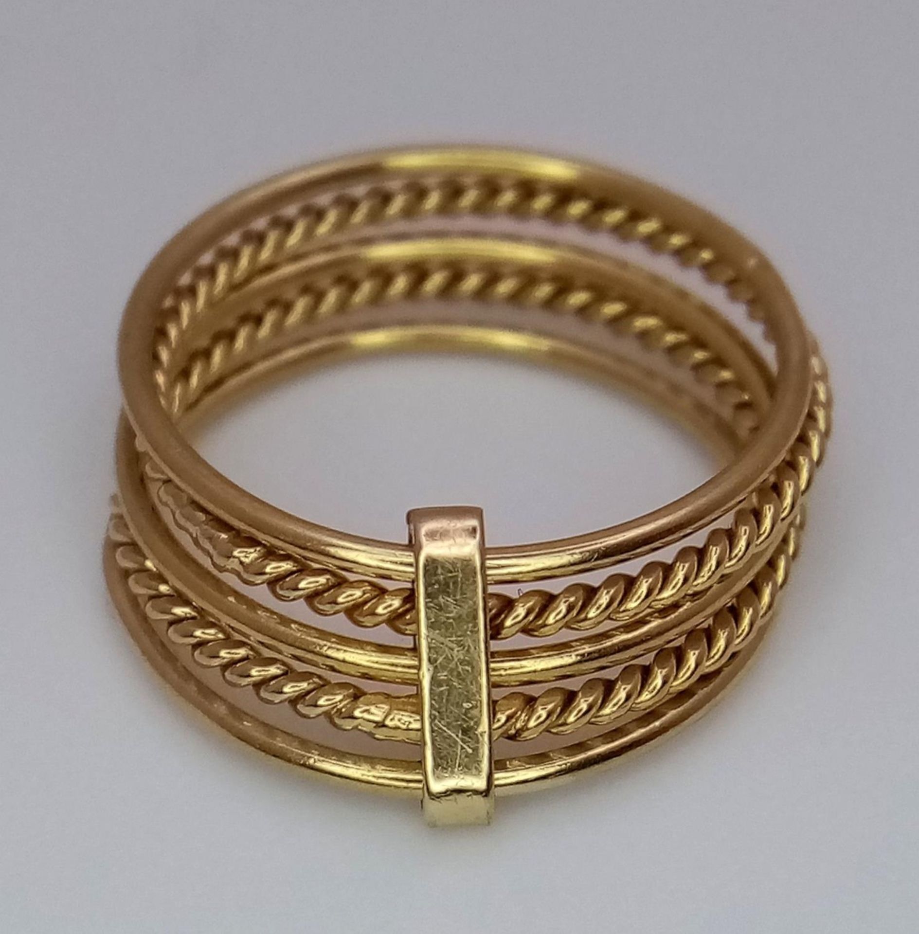 A 16ct Yellow Gold (tested as) Stacking Ring, size I, 2.7g total weight. ref: 1515I