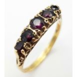 A Vintage 9K Yellow Gold Five Stone Garnet Ring. Size R. 2.8g total weight.